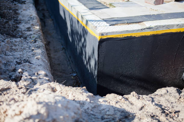Professional Waterproofing technician working in Newtown Square, PA